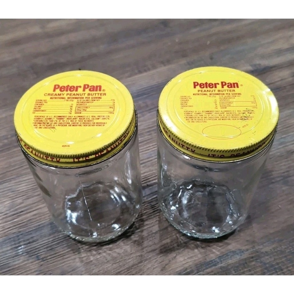 2 Vintage Peter Pan Peanut Butter Jar w/ Lid no wrap  "It's Peanutty"